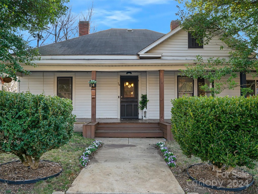 Welcome home to 14 Pine Grove Avenue just minutes from Downtown Asheville.