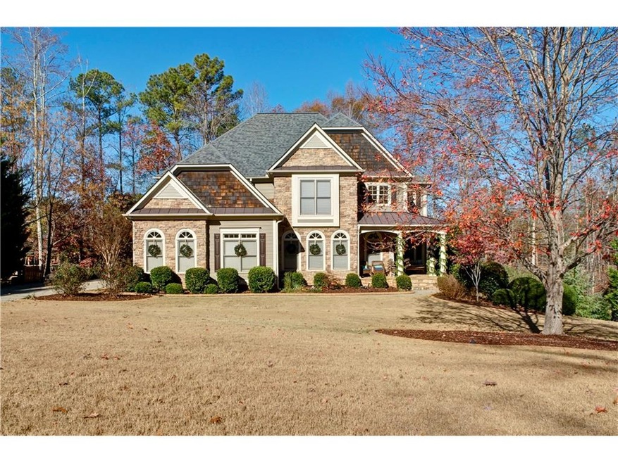 Elegant stacked stone 6 bedroom/5 bath sits beauti