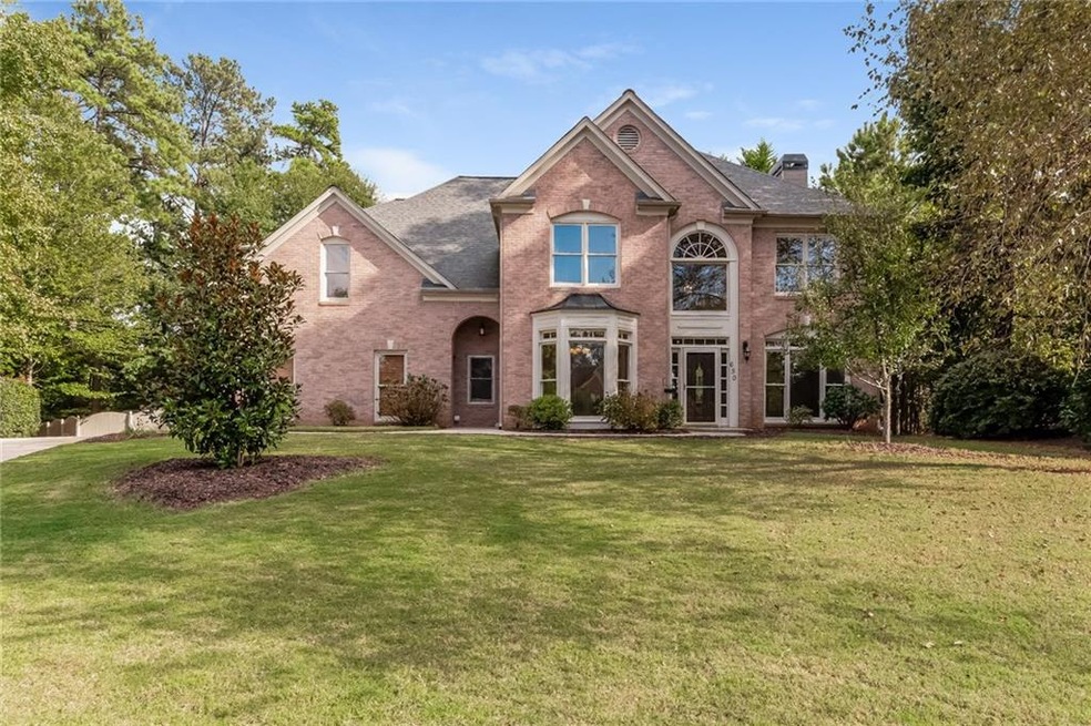 Beautiful Brick home in Stoneridge! Located on a p