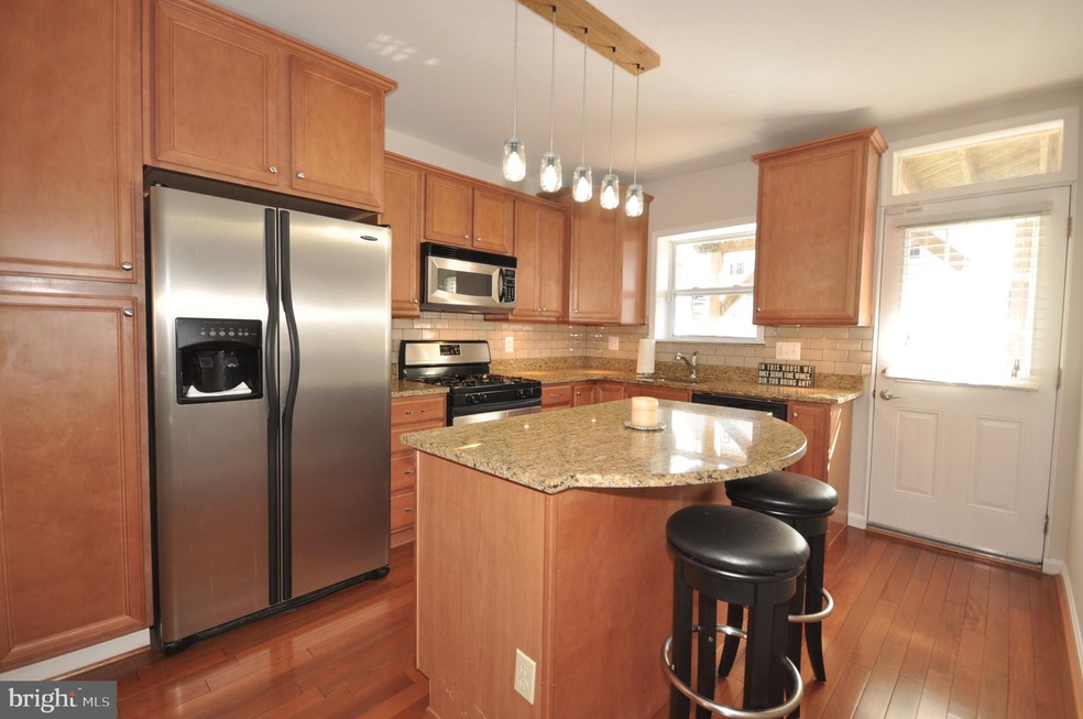 207 S Robinson St, Baltimore, MD 21224 - photo 1