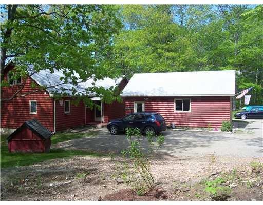 Exterior Front. Entry and garage.