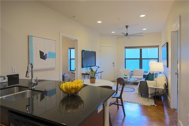 Modern finishes throughout the condo with low main