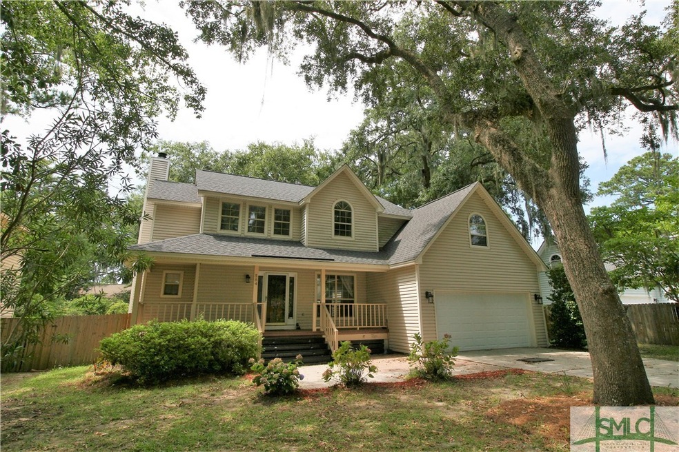 Great Front Porch with moss draped oak trees blowi
