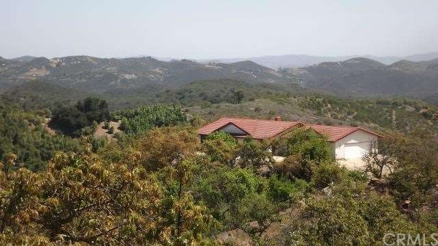 Home sitting amongst the avocado grove with views 