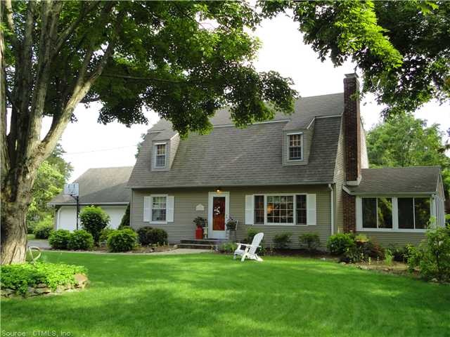 Exterior Front. Pristine Landscaping Welcomes You 