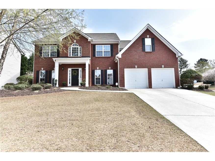 Nice curb appeal...awesome Bermuda lawn...corner l