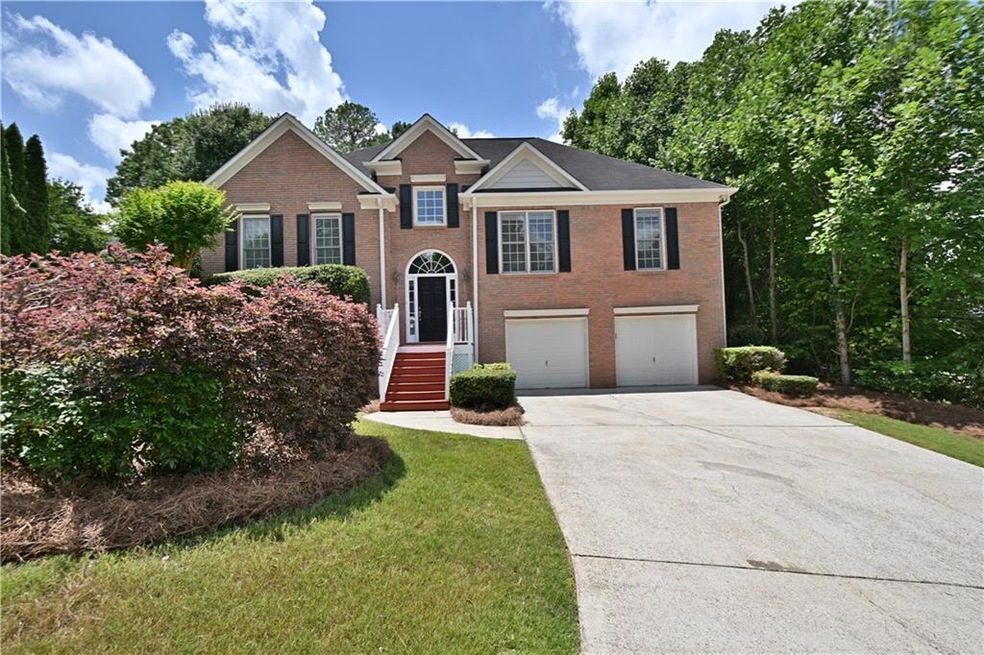 Split foyer with level driveway.