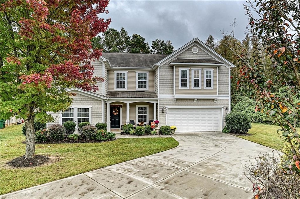 Front of house and long driveway