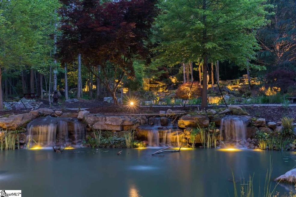 Surrounded by 4 separate ponds, 9 different waterf