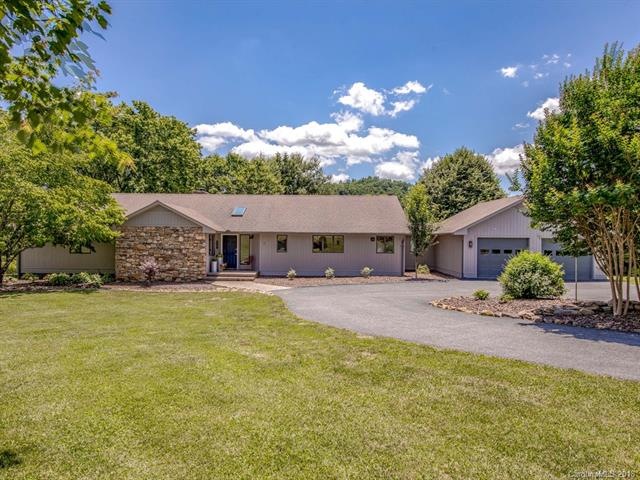 Freshly Painted Exterior and nice level 1 acre lot