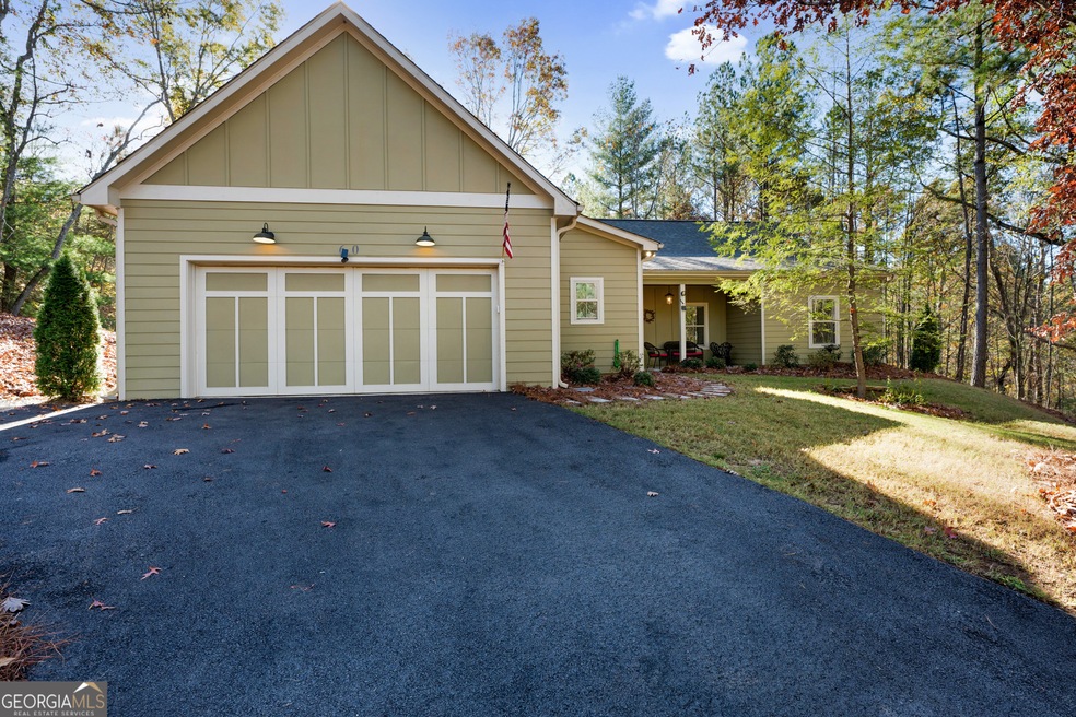 2 car garage, paved driveway