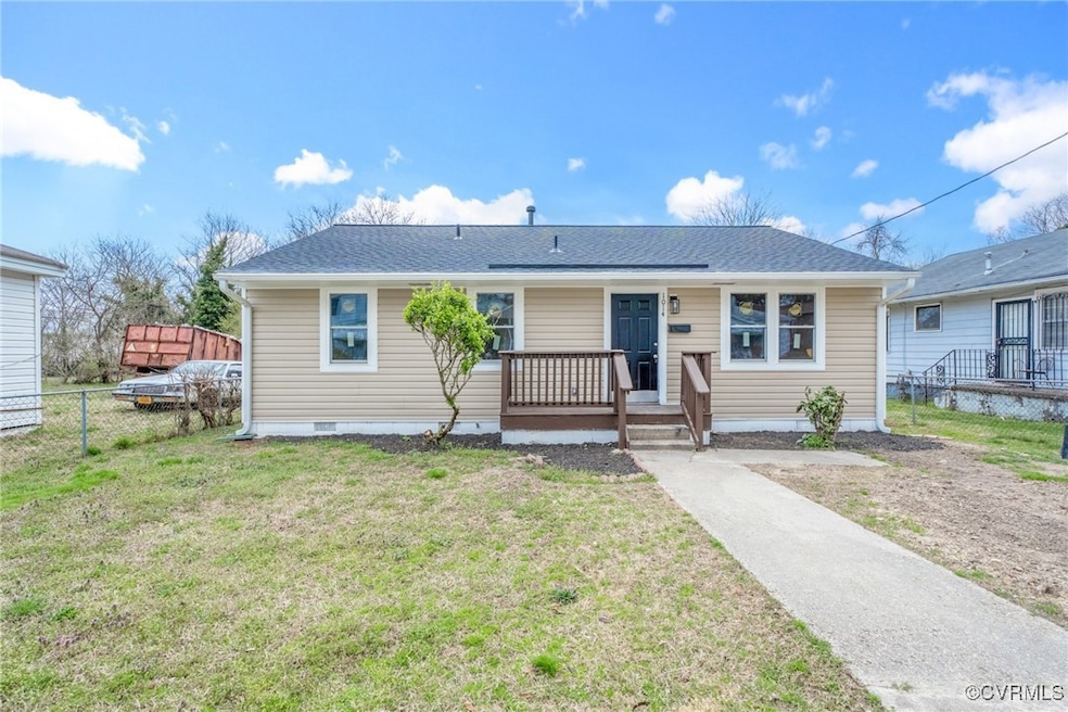 View of front of house featuring roof with shingle