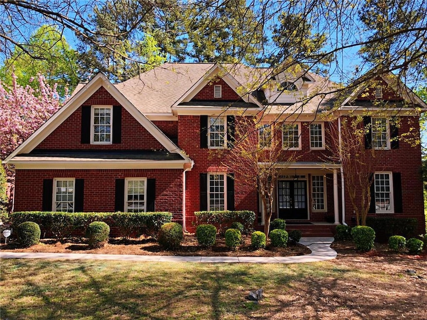 View of front of property with a front yard