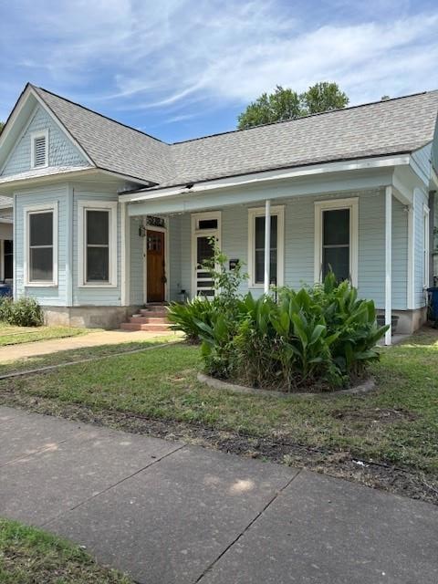 View of front of property featuring covered porch