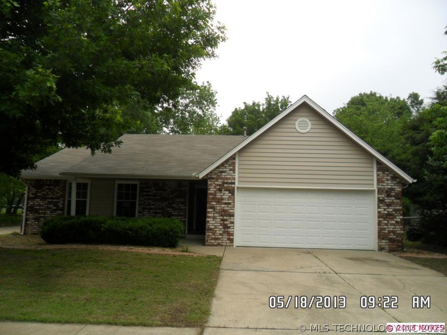 Low maintenance exterior with vinyl siding and bri