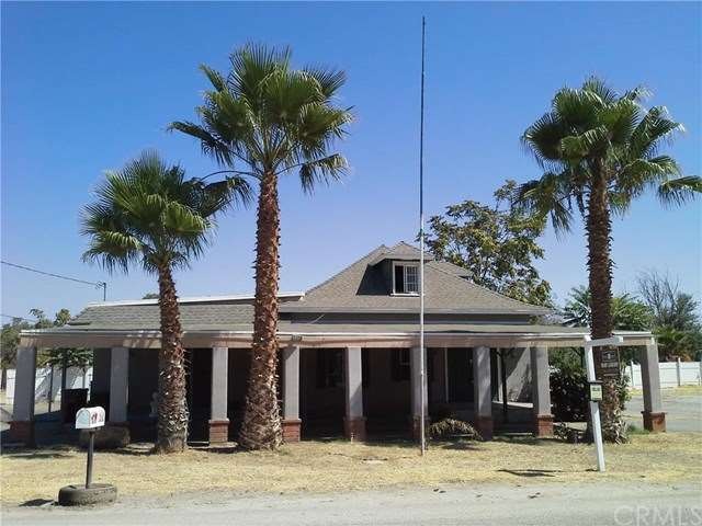 FRONT OF HOME WITH COVERED CARPORT