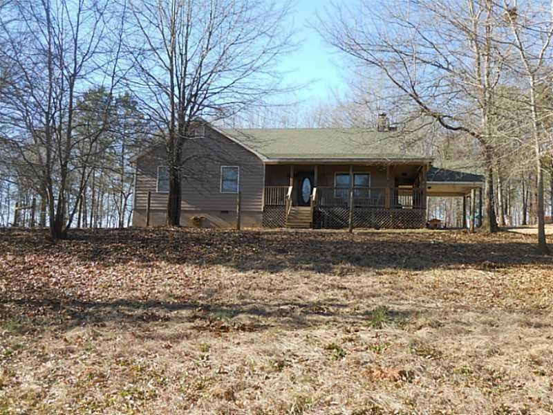 Exterior Front. View from the pasture to the house