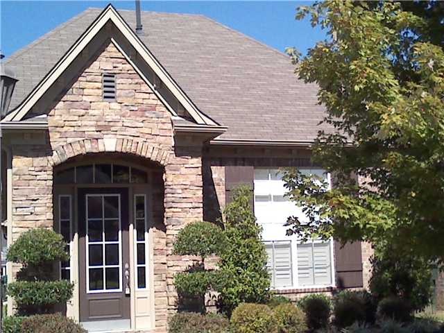 Stone Front - Plantation Shutters