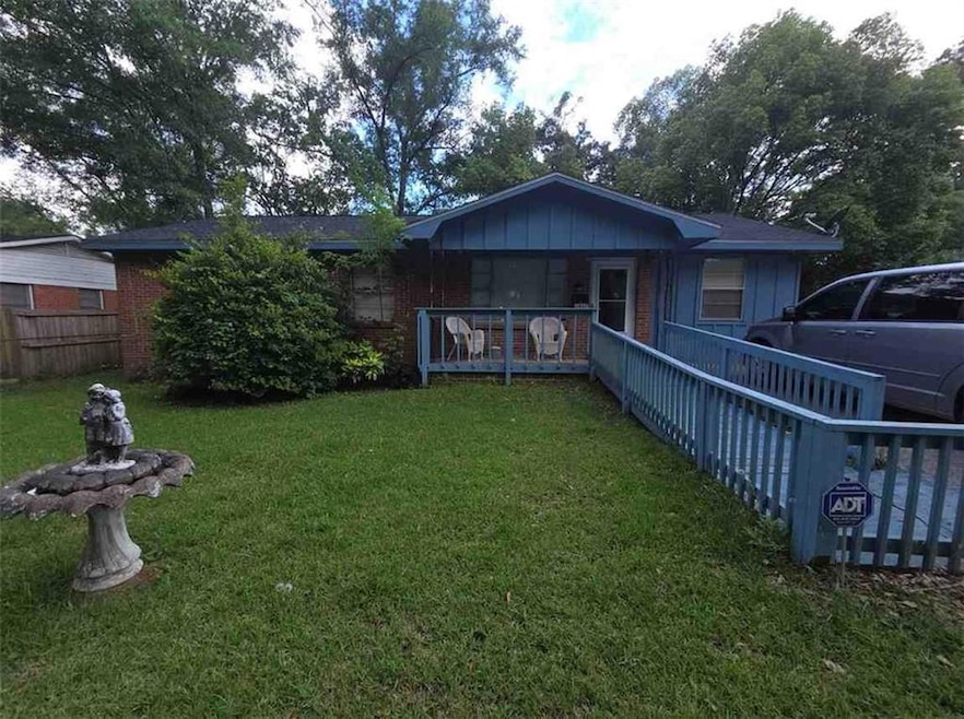 Back of property with board and batten siding