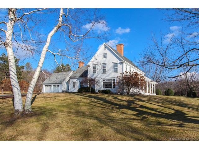 Welcome home to 210 Johnnycake Mountain Road!