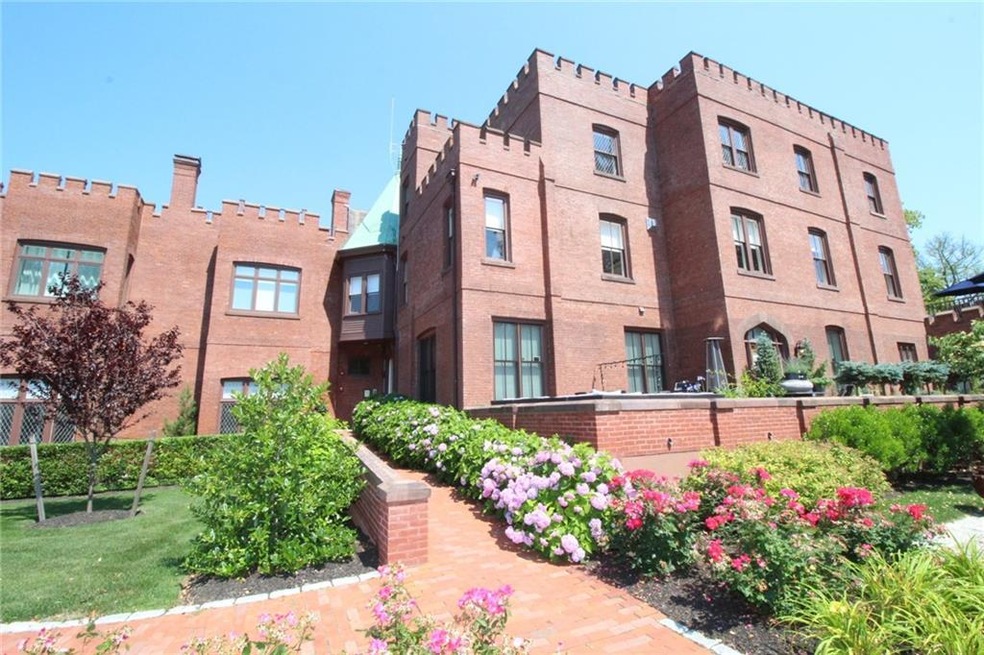 Eastborne Lodge. Gently sloped brick walkway leads