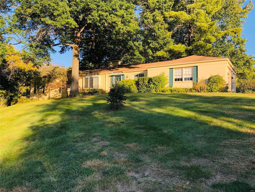 House on a hill provides majestic view of trees, gardens, and the occasional family of white tailed deer!
