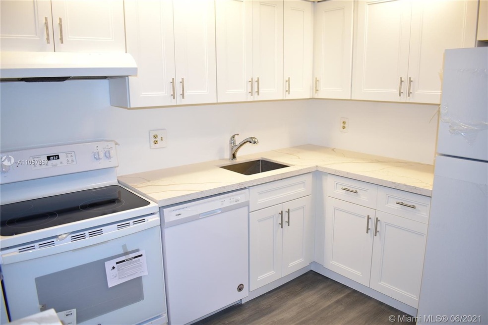 New white shaker cabinets with warm honey oak inte