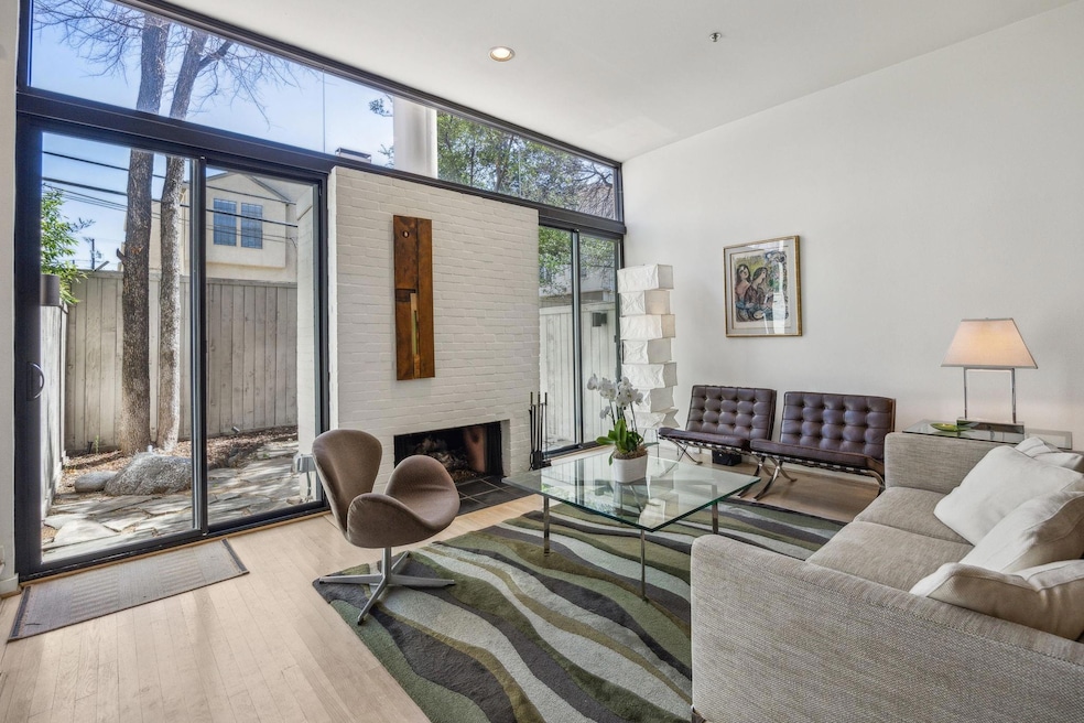 Welcome to 3922 Travis St – a modern retreat with 