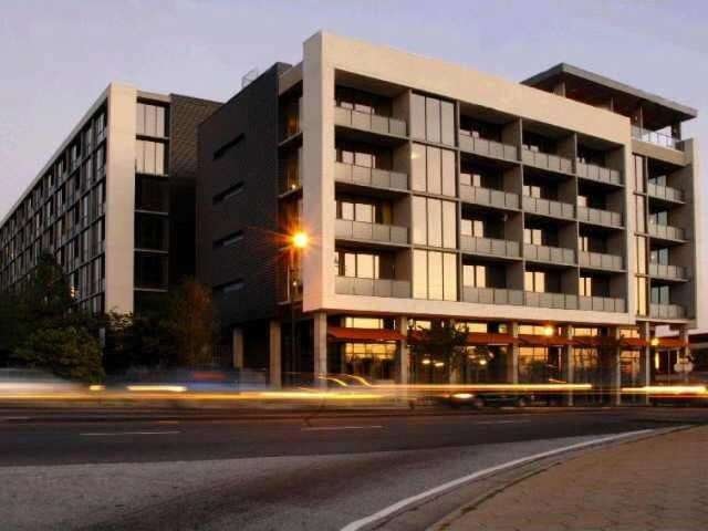 Exterior Front. Tribute Lofts is located in one of