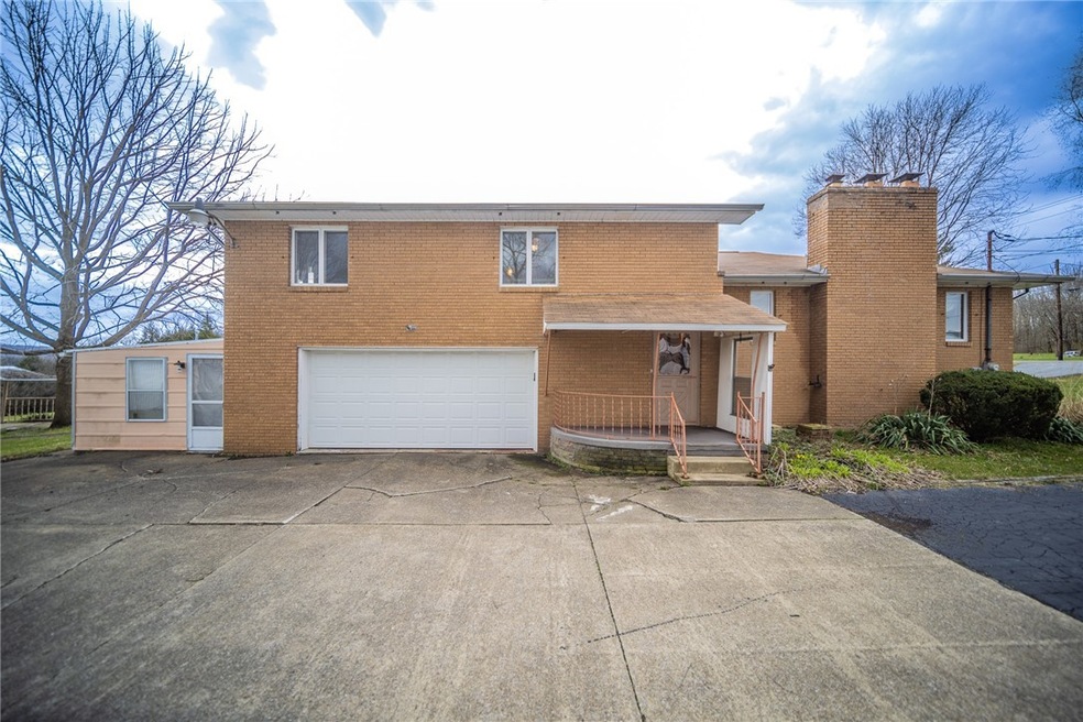 Solid Brick 4 sides 2 car attached garage
