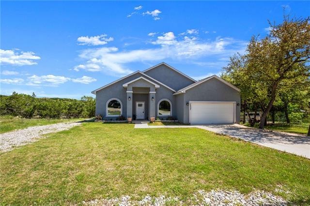 Welcome Home!  Enjoy Peace & Privacy in this Beautiful Home on nearly two thirds of an Acre