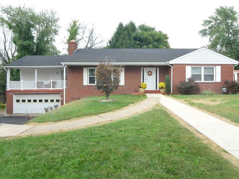 Exterior Front. This  three bedroom two bath solid
