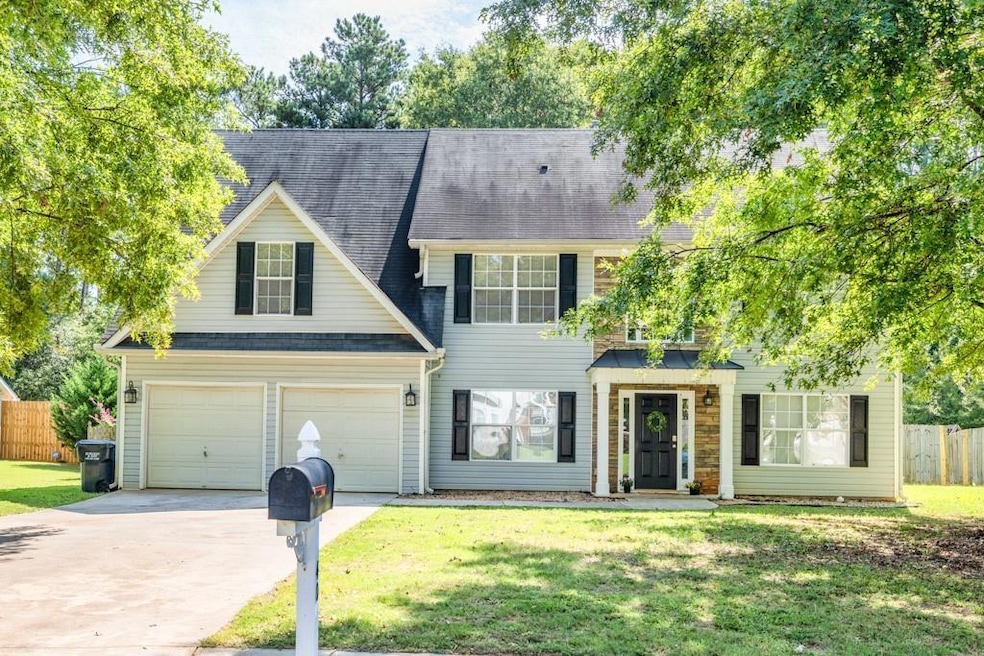 This stunning 5 bedroom RENOVATED home features brand new interior paint, all new flooring, and a new bathroom vanity!