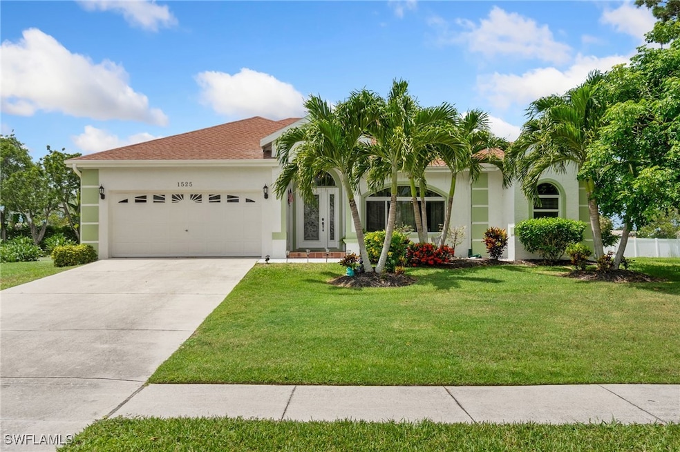 Mediterranean / spanish house featuring a garage,
