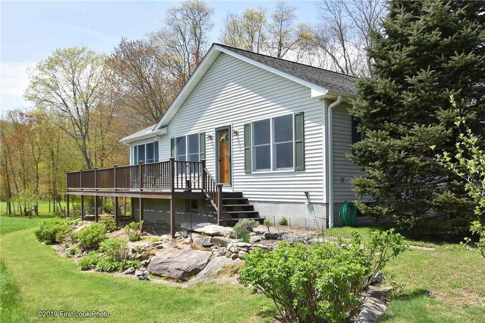 Front of house overlooking pond