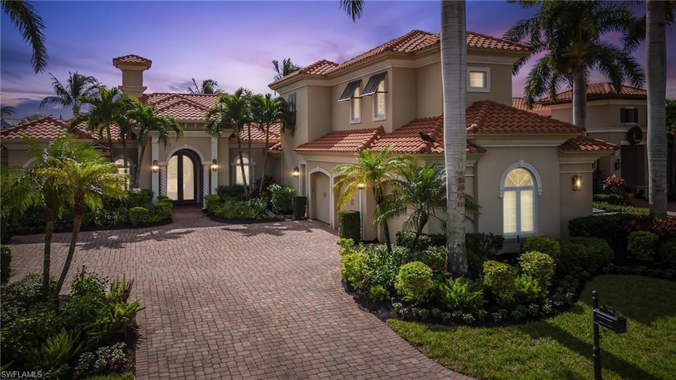 Mediterranean / spanish house with a lawn and fren