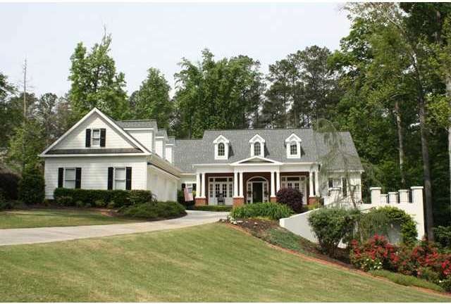 Exterior Front. Inviting front porch, three car ga