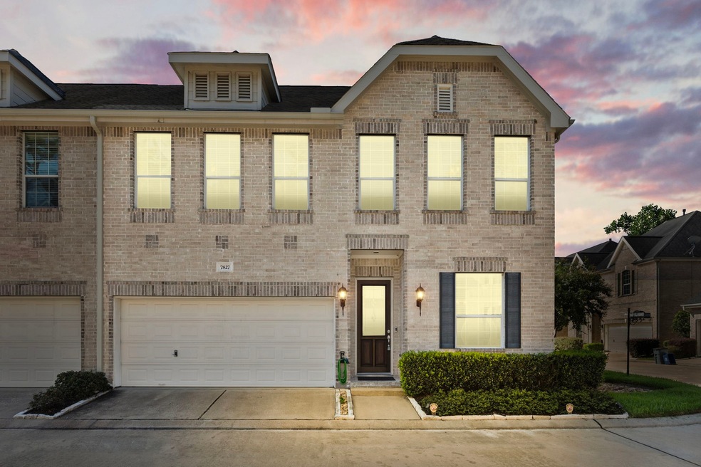 Classic brick beauty in small gated community.