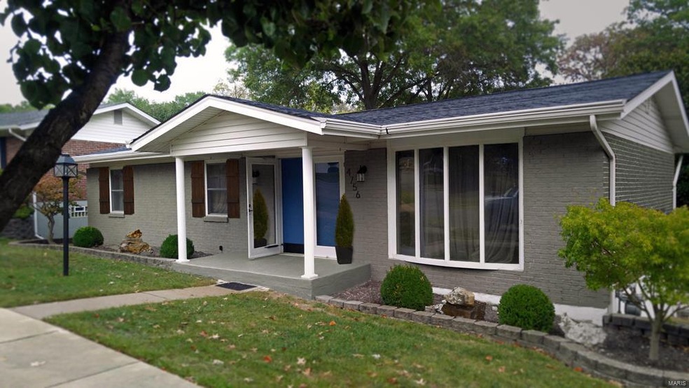 Freshly painted and newly landscaped exterior.