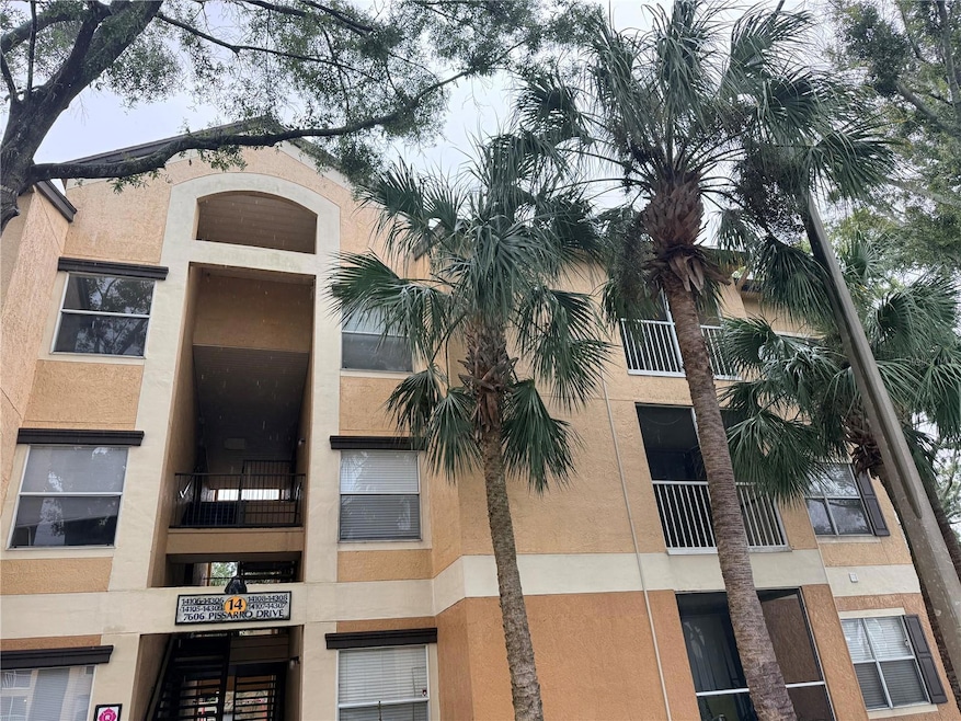 7606 Pissarro Dr unit 105, Orlando, FL 32819 - photo 1
