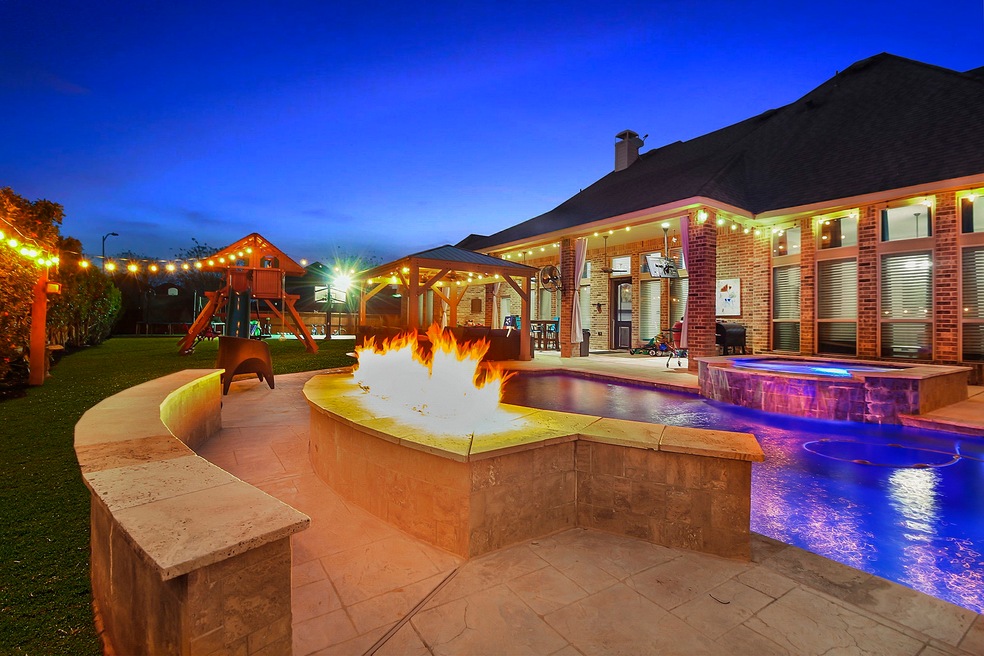 28602 North Firethorne Road offers a sparkling heated Pool with relaxing Spa! ***YOU are going to fall in love with everything about this Home***