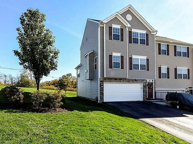 Exterior Front. Move In Ready.  Private end unit.