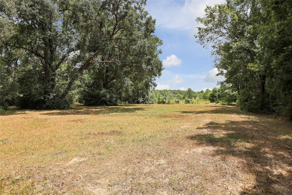 This is part of the whole 15.8 acres. The 5.8 acres is on the right side of the property and is wooded.