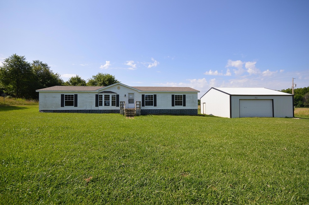 Sweet home on 5 glorious acres!