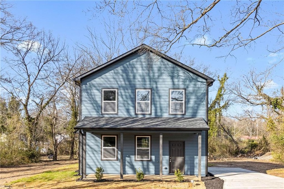 Front of property with covered porch