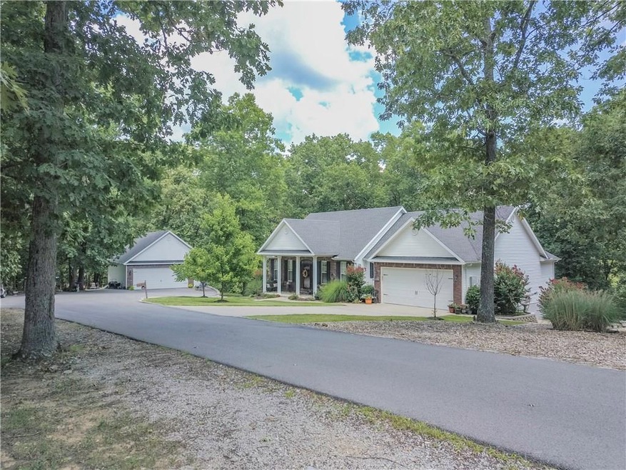 No gravel road here!  Drive up to your new home on a newly paved road.