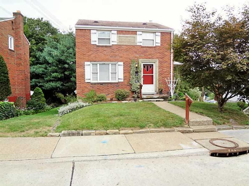 Exterior Front. Carrick - 3 Bedroom Two story Bric