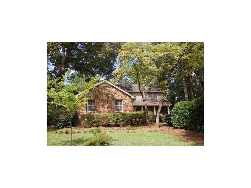 Exterior Front. Classic East Cobb Stone Front Trad