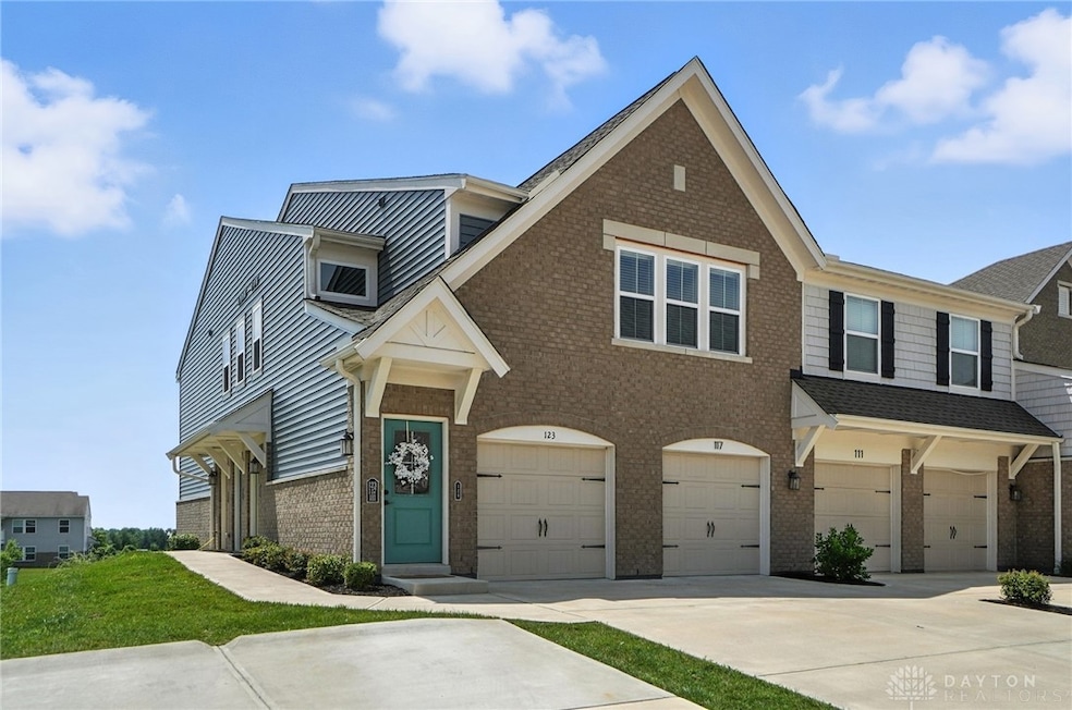 Unit's front door is on the side of the Building