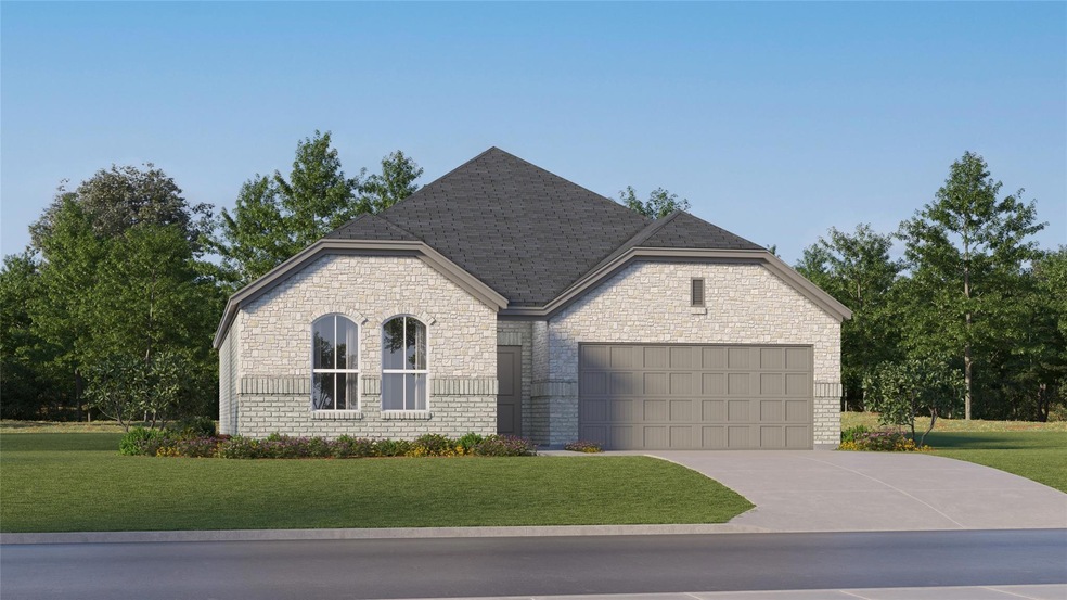 French country style house with driveway, an attac